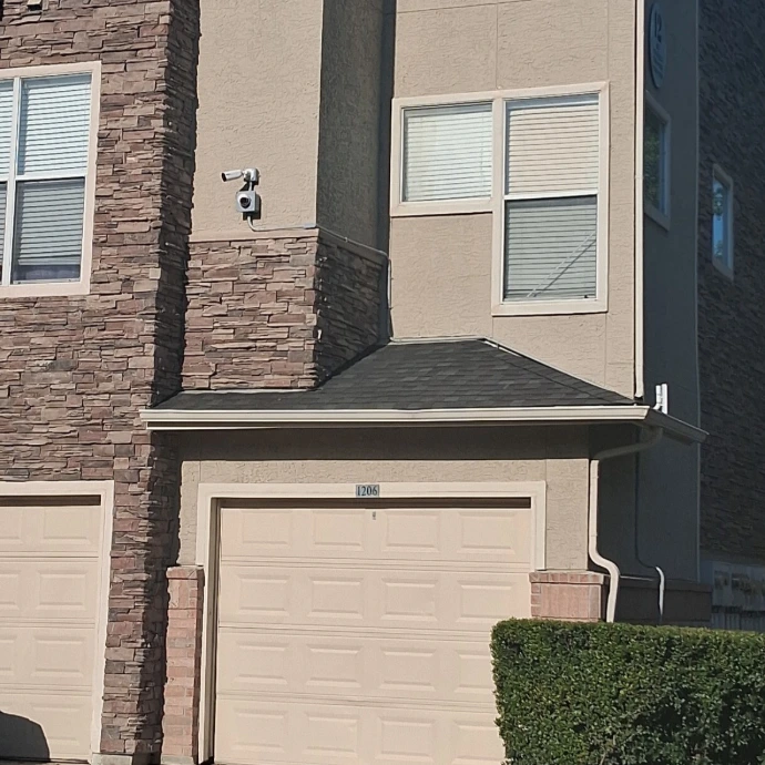 Surveillance cameras on apartment building.